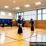Home 19 검도 수련 장소 예약 - A spacious, well-lit kendo dojo interior in a modern Spanish gymnasium, featuring polished wooden fl...